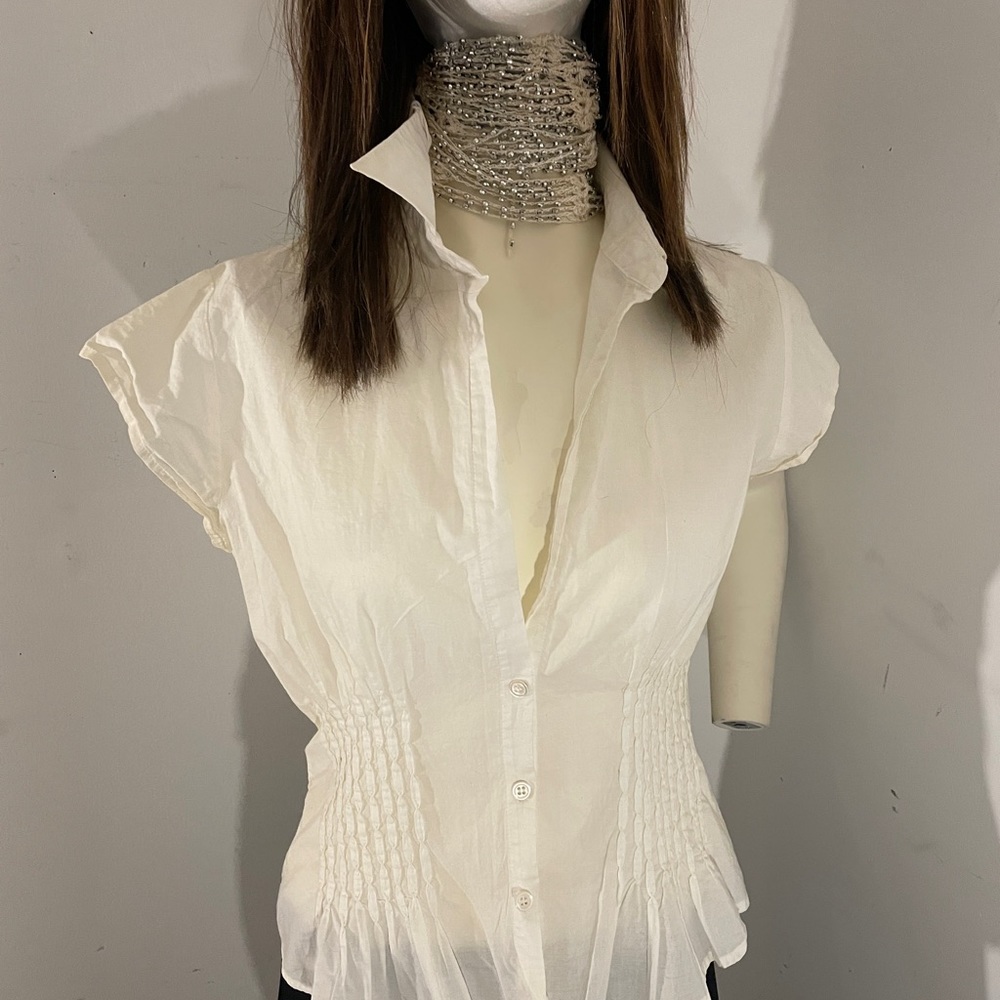 White Julia size 6 purchased at Neiman Marcus 2007. I kept it Beautiful.